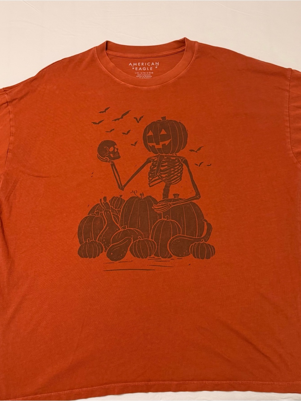 American Eagle Outfitters Men’s Orange Graphic Pumpkin Skeleton Tee